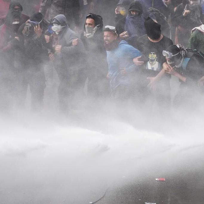 In initial win for Argentine President Milei, senators approve his key bills after violent protests